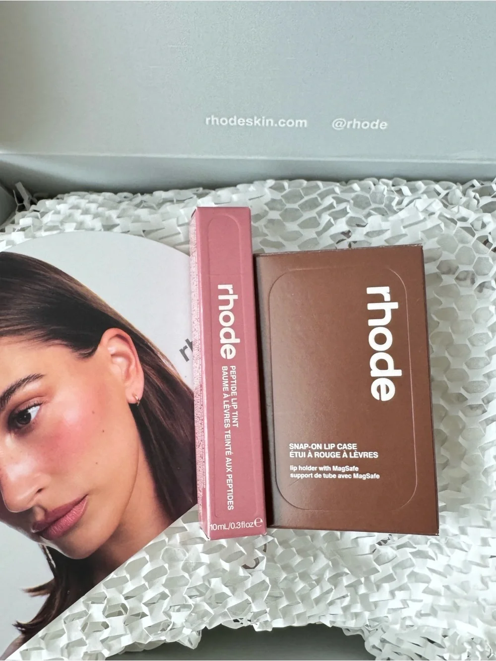 RHODE limited edition Snap-On Lip Case in Bronze + peptide lip tint in Salty tan